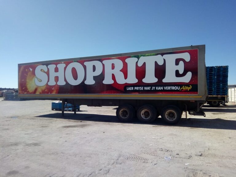 Large-scale commercial fleet branding and high-durability vinyl truck trailer wrap installed for Shoprite by Specifusion