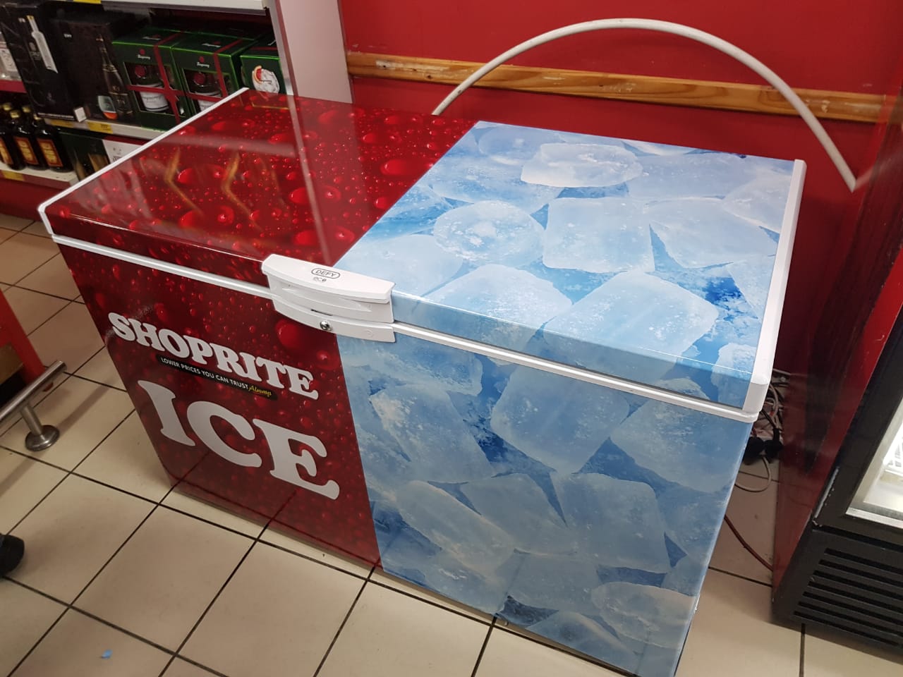 Custom high-durability vinyl ice box wrap for Shoprite Holdings, fabricated and installed by Specifusion at their Musina, Limpopo facility