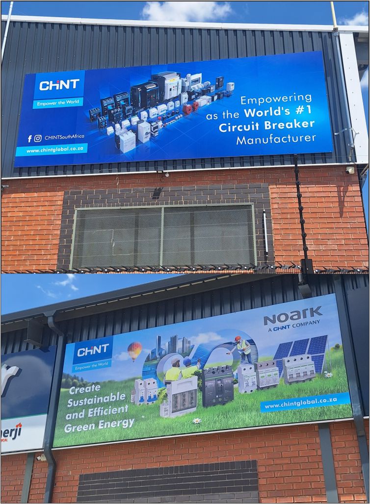 Custom fabricated green ACM signage for CHINT with the tagline "Empower the World," professionally installed flush on a modern grey commercial building facade by Specifusion.